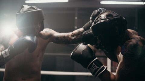 man in black boxing gloves